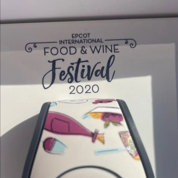 Dooney & Bourke Limited Release Magic Band- White and Multicolor - Picture 2 of 8